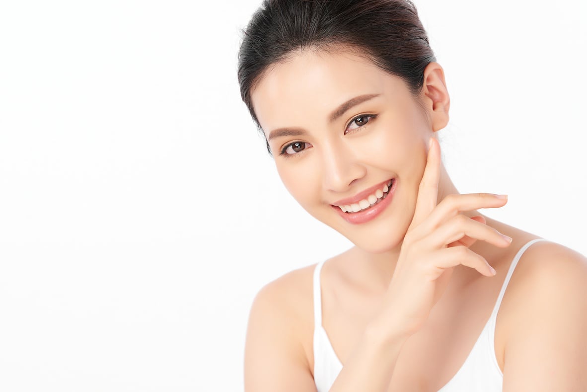 Woman with Clean Fresh Skin on White Background